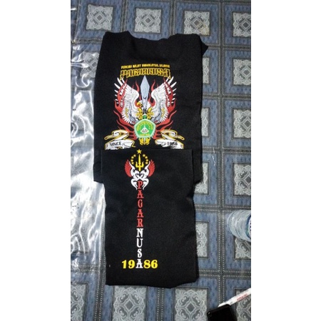 Sakral bordir pagar nusa motif Garuda