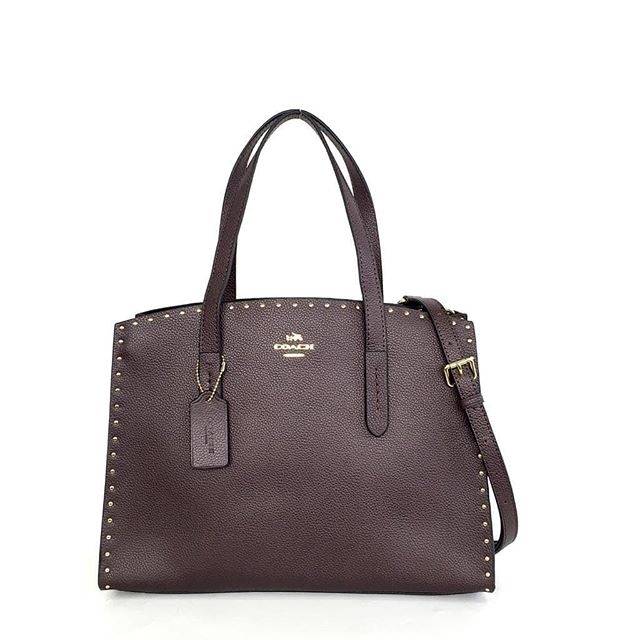 COACH Charlie Carryall Oxblood Rivets