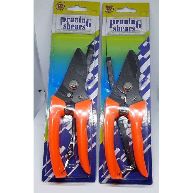 GUNTING DAHAN MERK TIGER