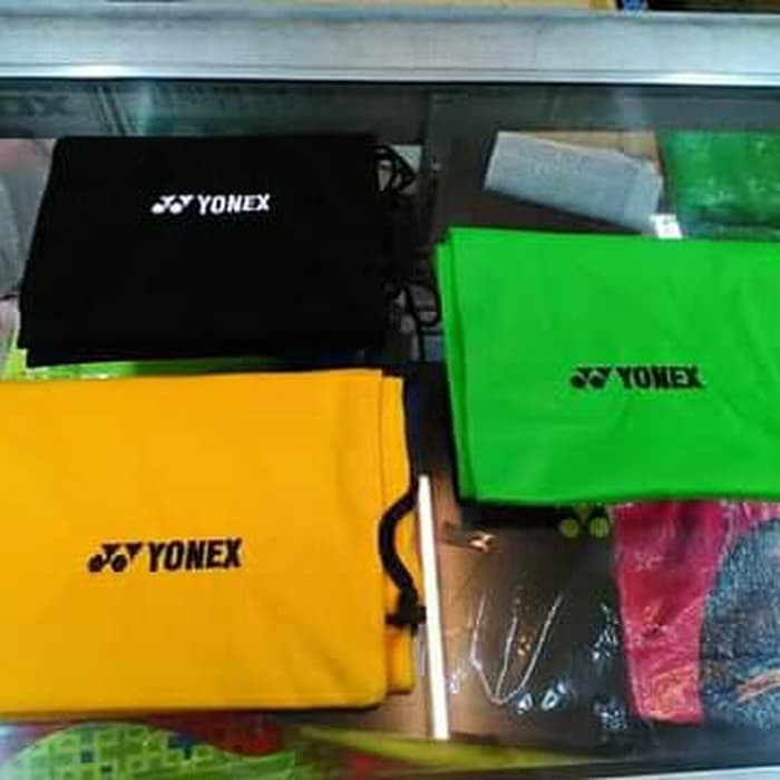 tas kain raket badminton