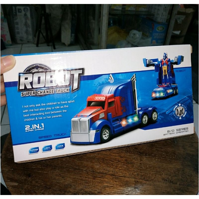 Mainan anak Robot jadi Mobil pakai baterai batre ada musik dan lampu bump and go optimus prime