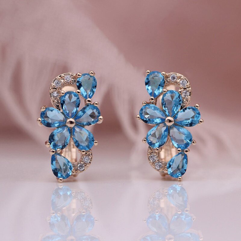 Anting Juntai Bentuk Kelopak Bunga Plum Warna Rose Gold Hias Zirkon Biru Untuk Wanita