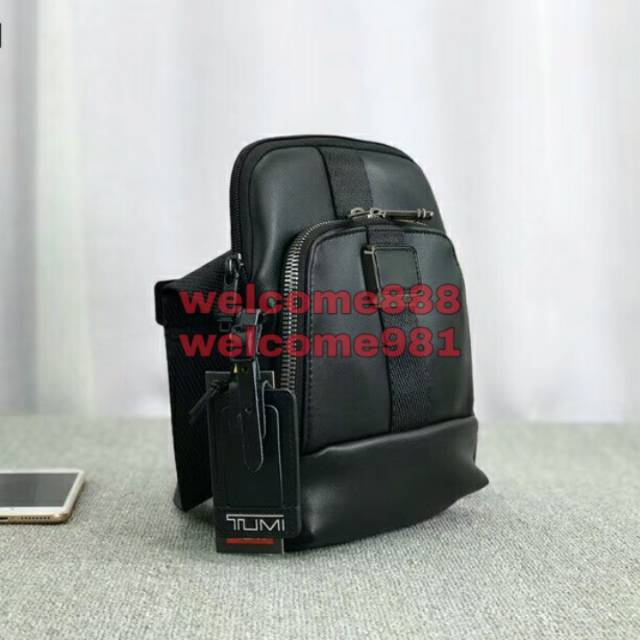 Tas selempang tumi leather qty mirror