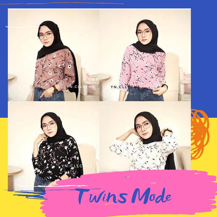 Kemeja Wanita dengan Model Potongan Longgar Lengan Panjang Kemeja Wanita dengan Model Potongan Longgar Lengan Panjang
