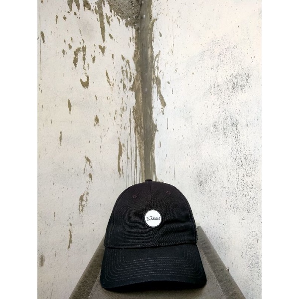 topi Titleist second