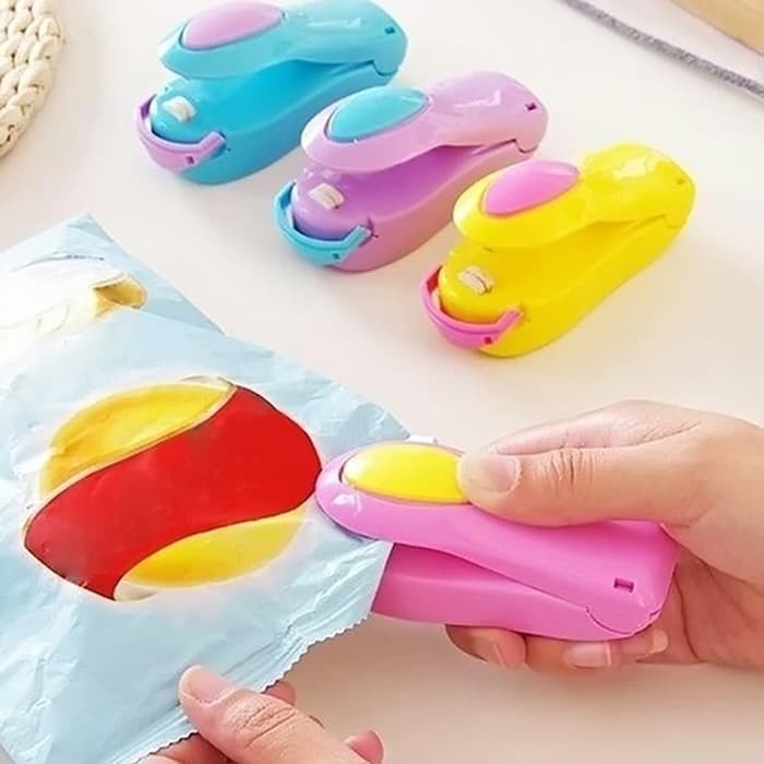 Perekat Plastik Pembungkus Makanan Elektrik Mini Hand Sealer