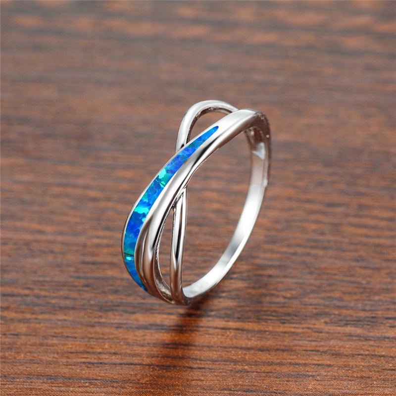 New product Europe and America imitation Opal vitality forest design cross ring ladies fashion ring