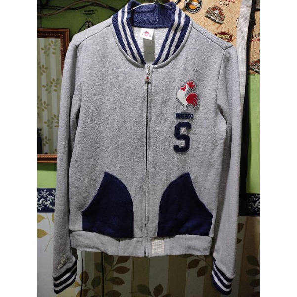 Ziper le coq sportif