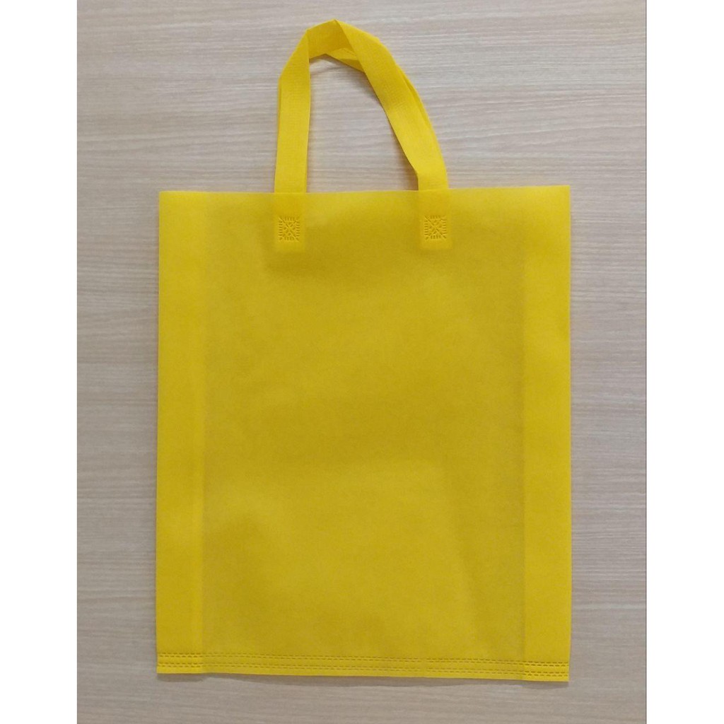 

GOODIE BAG SPUNBOND HANDLE 38x45 (Per Lusin) / Tas Belanja Murah / Kantong Belanja / Souvenir