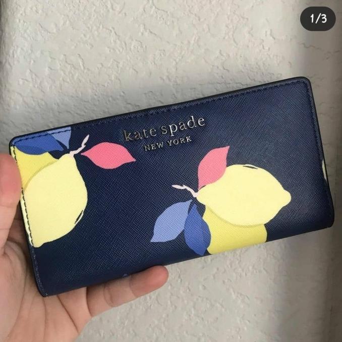 dompet kate spade   ks cameron large slim bifold wallet lemon blue bb