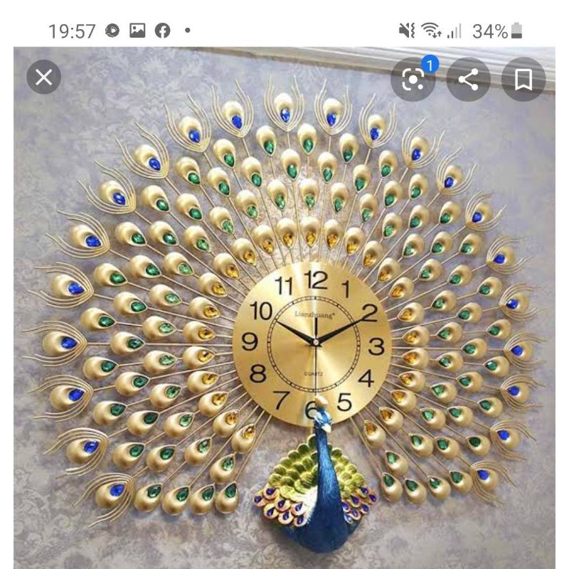 jam dinding keramik merak