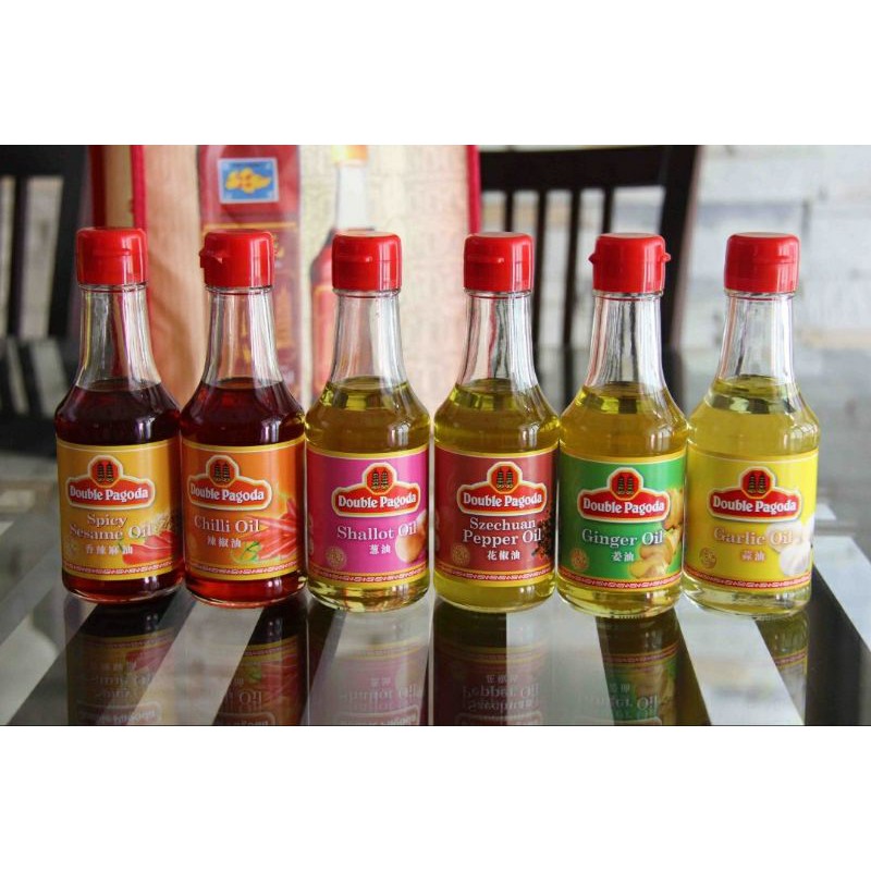 

Double Pagoda Garlic Oil Shallot Ginger Spicy Sesame Oil Minyak Jahe Bawang Putih Singapore Import