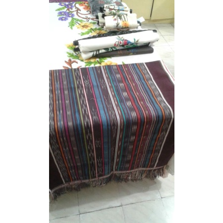 Ulos harungguan tenun muara