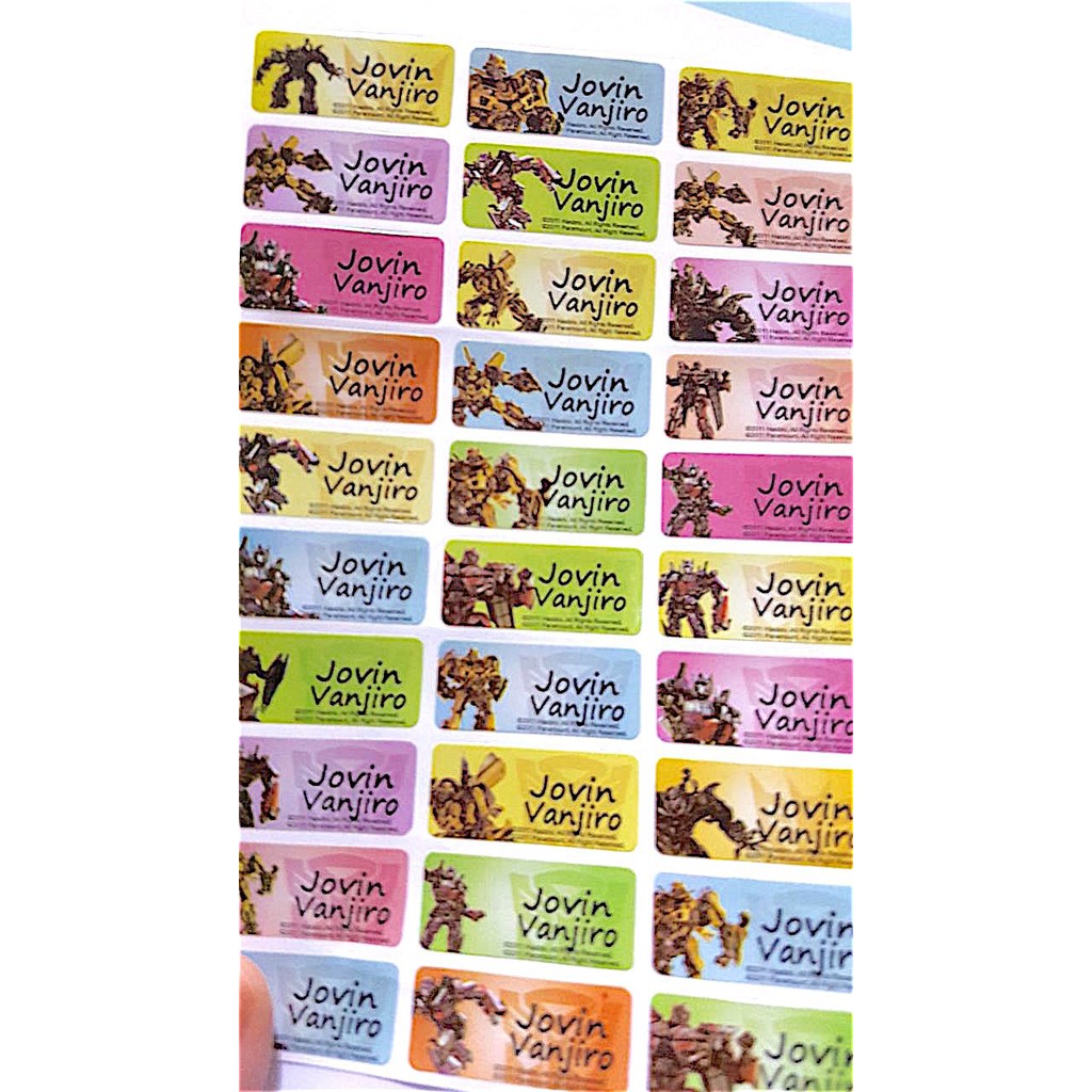 

Label nama anti air stiker waterproof Premium Transformers Full Color Ori