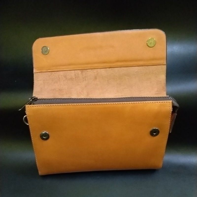 Clutch tas tangan pria dan wanita.kulit sapi jawa