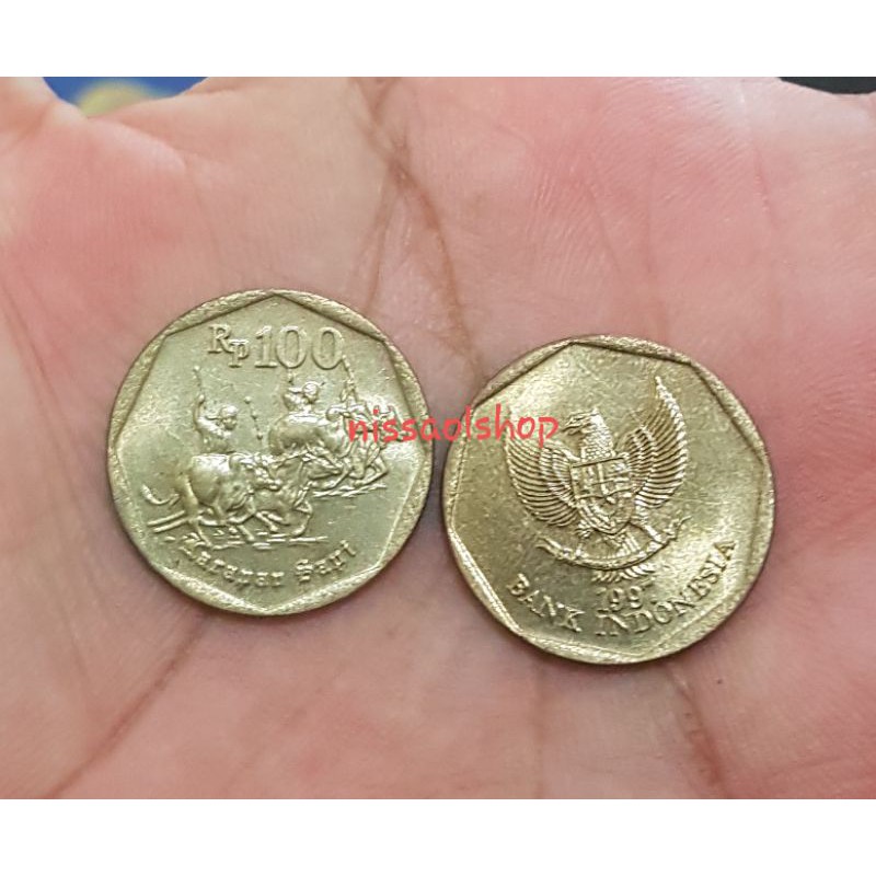 koin 100 rupiah karapan sapi