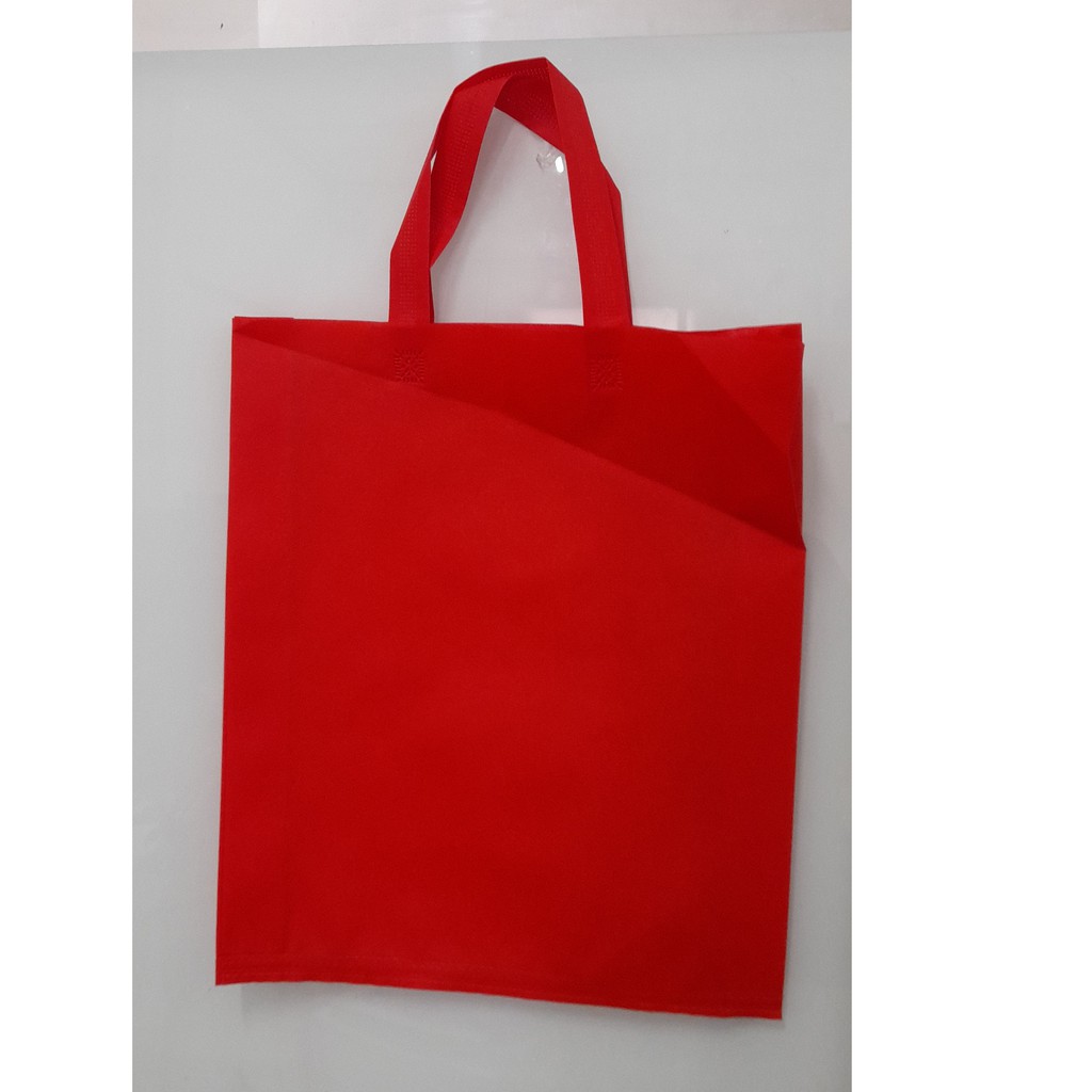 

Tas Press Spunbound Tali Goodie Bag Tas Belanja Warna Merah 38 cm x 45 cm