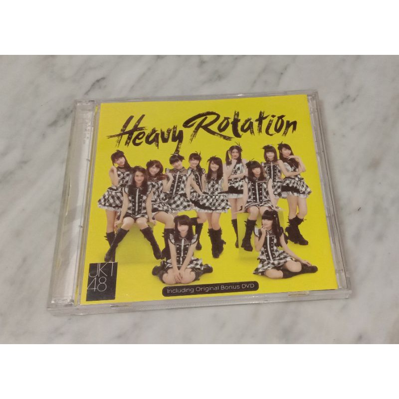 CD AUDIO JKT 48 ALBUM HEAVY ROTATION ( Bonus DVDnya gak ada)