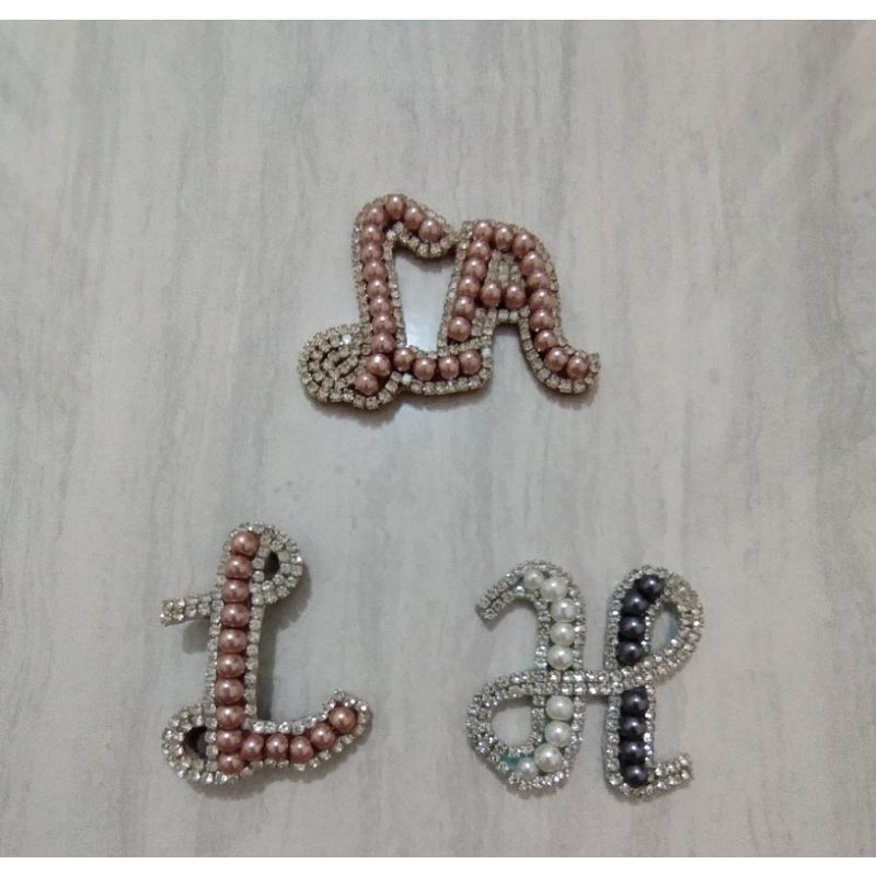 Bros Huruf LA, L dan H