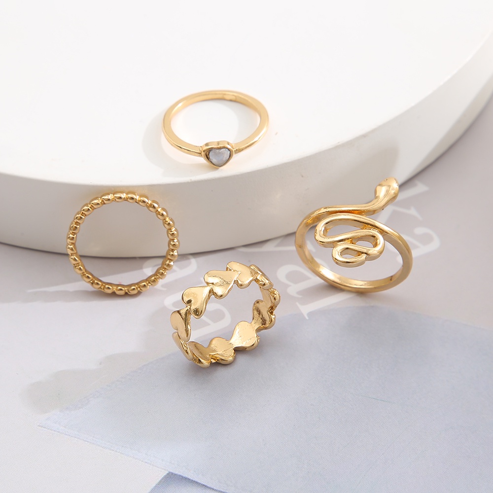 YEEZII 4pcs / Set Cincin Emas Bentuk Hati Ular Tidak Teratur Gaya Retro Untuk Wanita