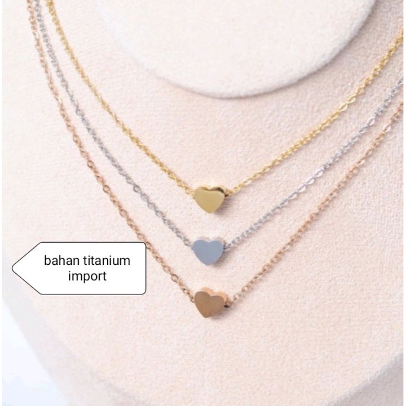 kalung titanium import