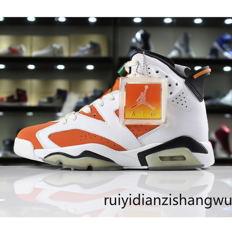 white and orange jordan 6