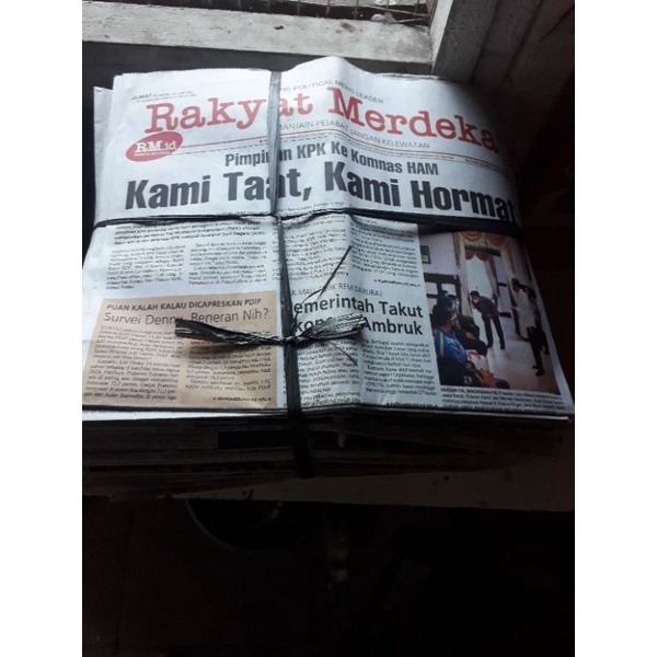 

koran bekas baca