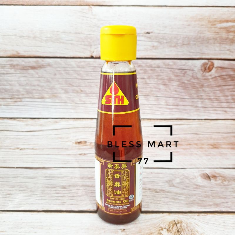 

Minyak Wijen Sin Tai Hing 210ml / STH Sesame Oil