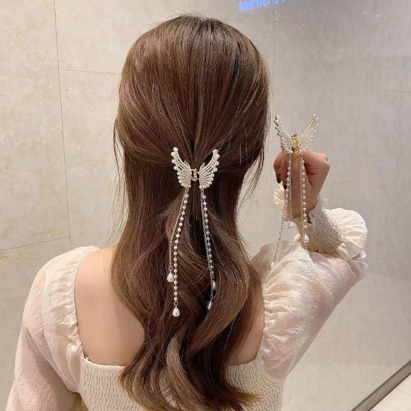 Jepit Rambut Model Rumbai Panjang Bentuk Sayap Aksen Mutiara Gaya Korea Untuk Wanita