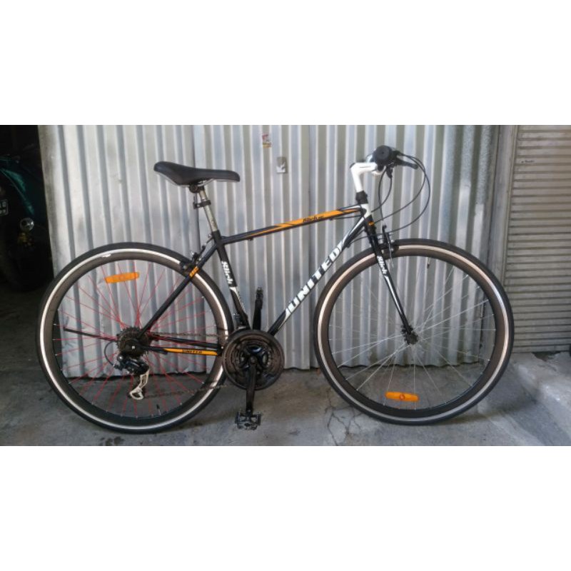 sepeda United Slick 02 hybrid ban 700 c