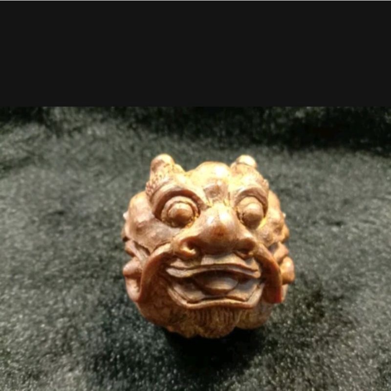 Ukir Bolà Kayu Naga