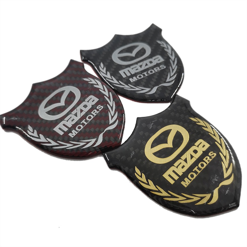 1pc Stiker Emblem Logo MAZDA MOTORS Bahan Karbon Fiber Untuk Dekorasi Jendela Samping Mobil MAZDA