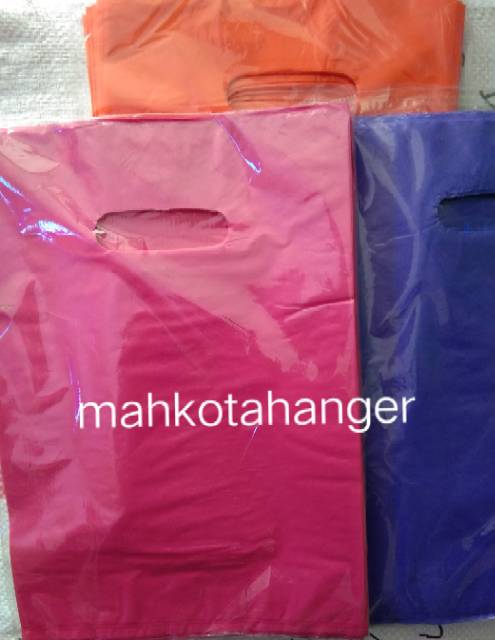 Kantong Plastik baju HD Oval polos  serbaguna