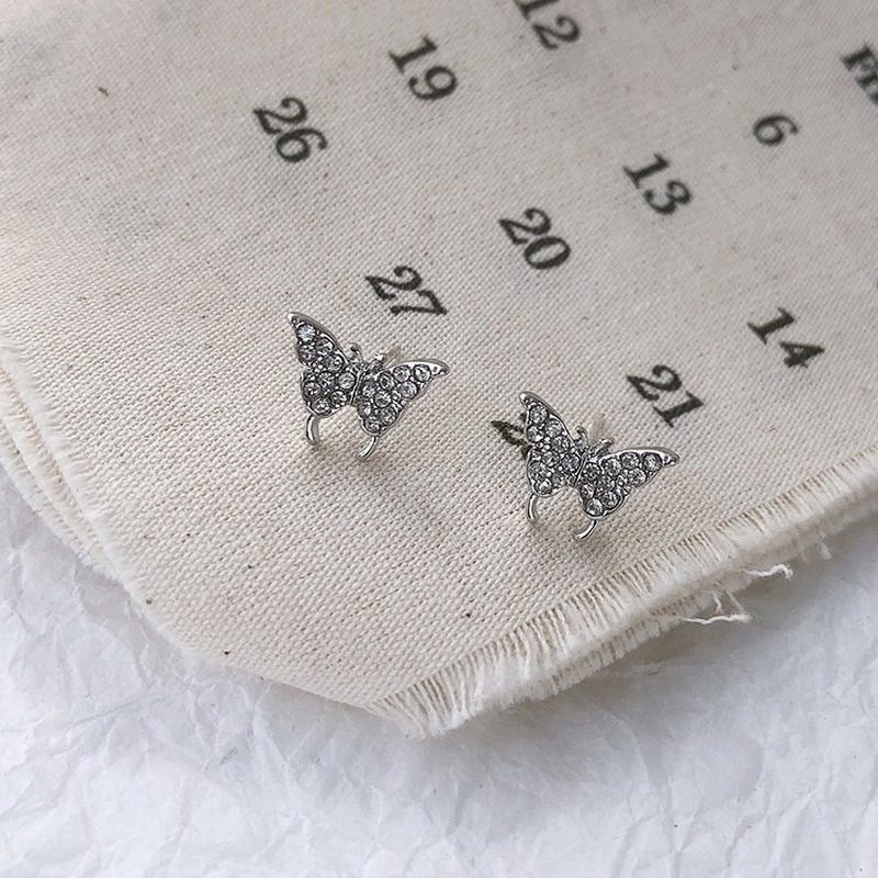 Korean version of super fairy temperament simple diamond butterfly earrings ins girl heart wild ear bone clip earrings