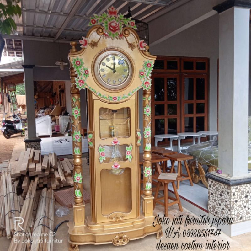 lemari jam hias ukir jepara