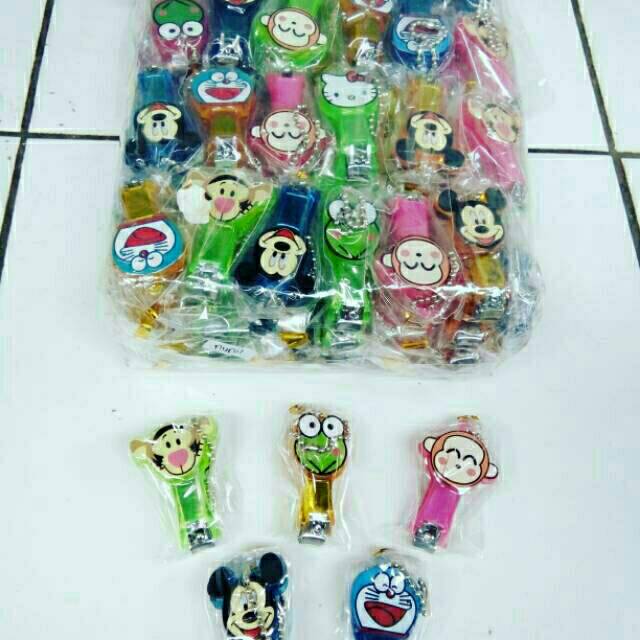 

Souvenir gunting kuku karakter kartun