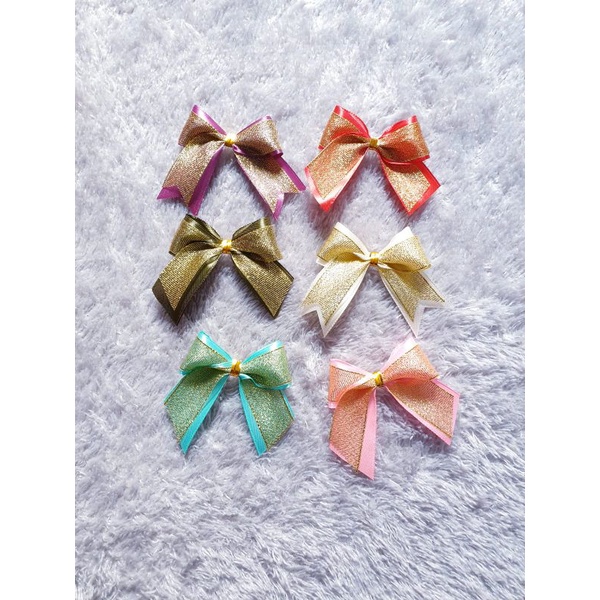 

pita satin jadi/pita tumpuk emas/pita souvenir