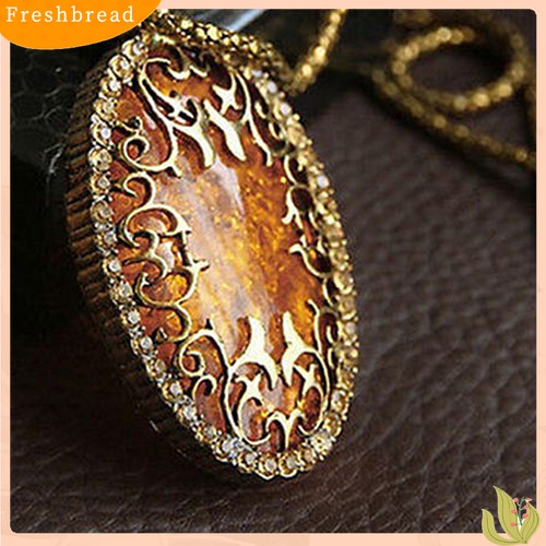 [TERLARIS]Women's Vintage Amber Tone Hollow Long Chain Drop Pendant Sweater Necklace