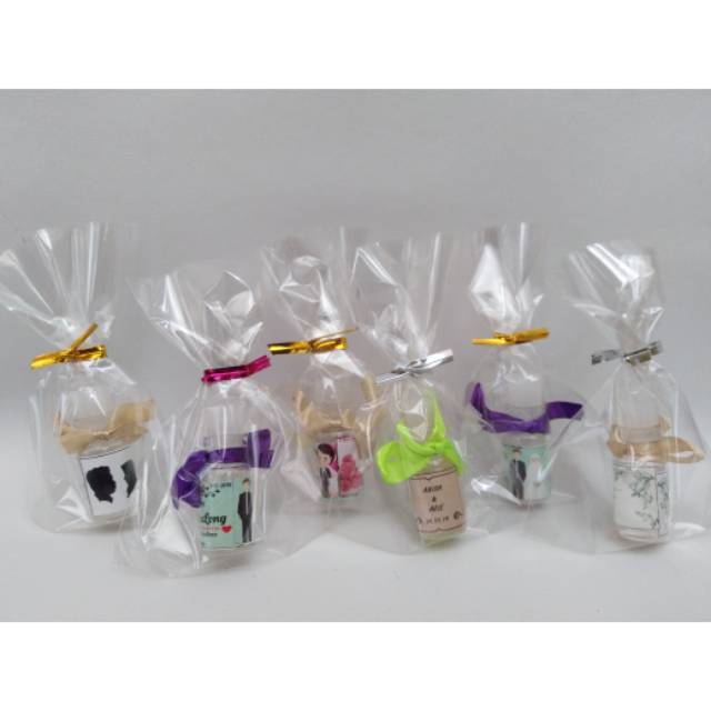 

Souvenir pernikahan, ulang tahun, khitanan, aqiqah, dll parfum unik botol 3ml packing plastik & pita