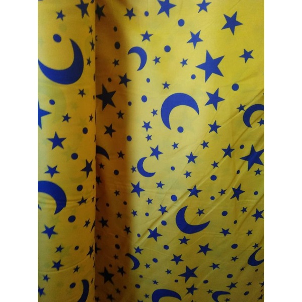 bahan kain sprei motif bulan bintang kuning biru meteran