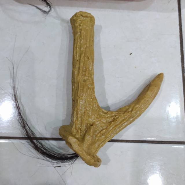 Gagang mandau dayak bentuk tanduk kijang bahan dari fiber