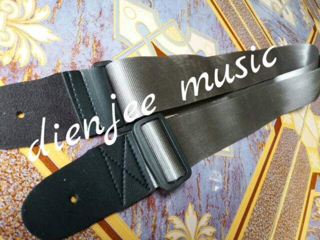 Sabuk gitar atau strap gitar bahan halus