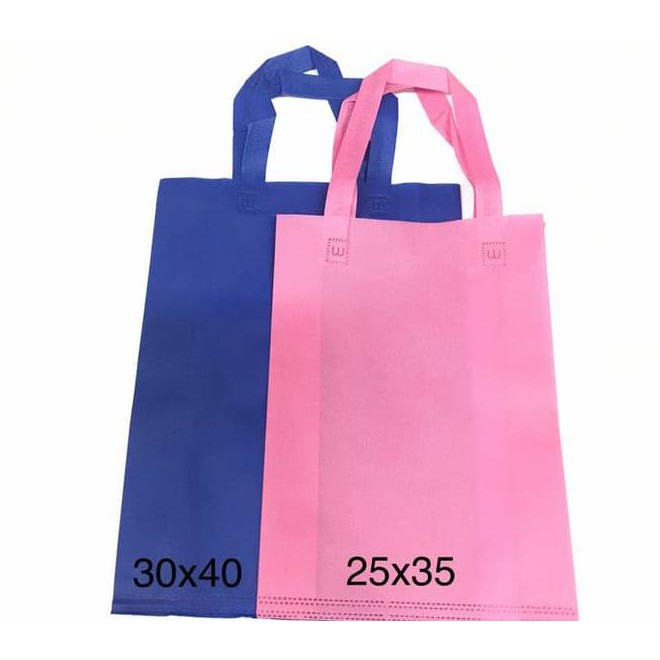 

Februari Maniss (25X35X10) Hls Goodie Bag Tas Kain Spunbond / Handle Lipat Samping Kode 539