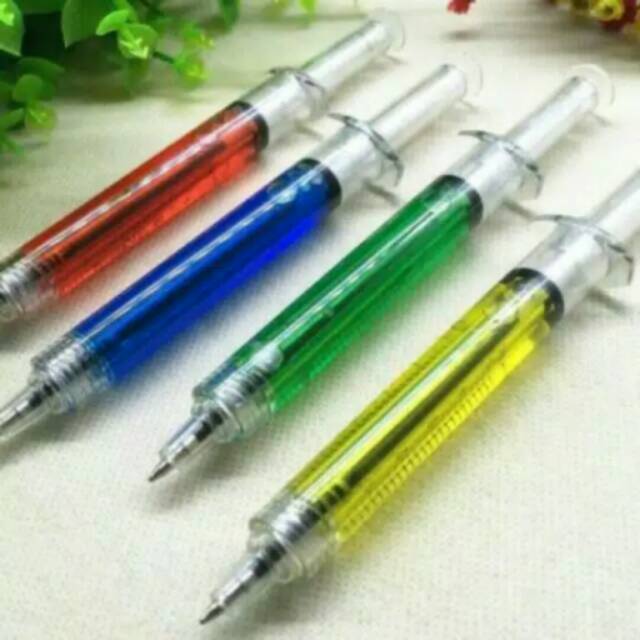 

Souvenir bolpen suntikan