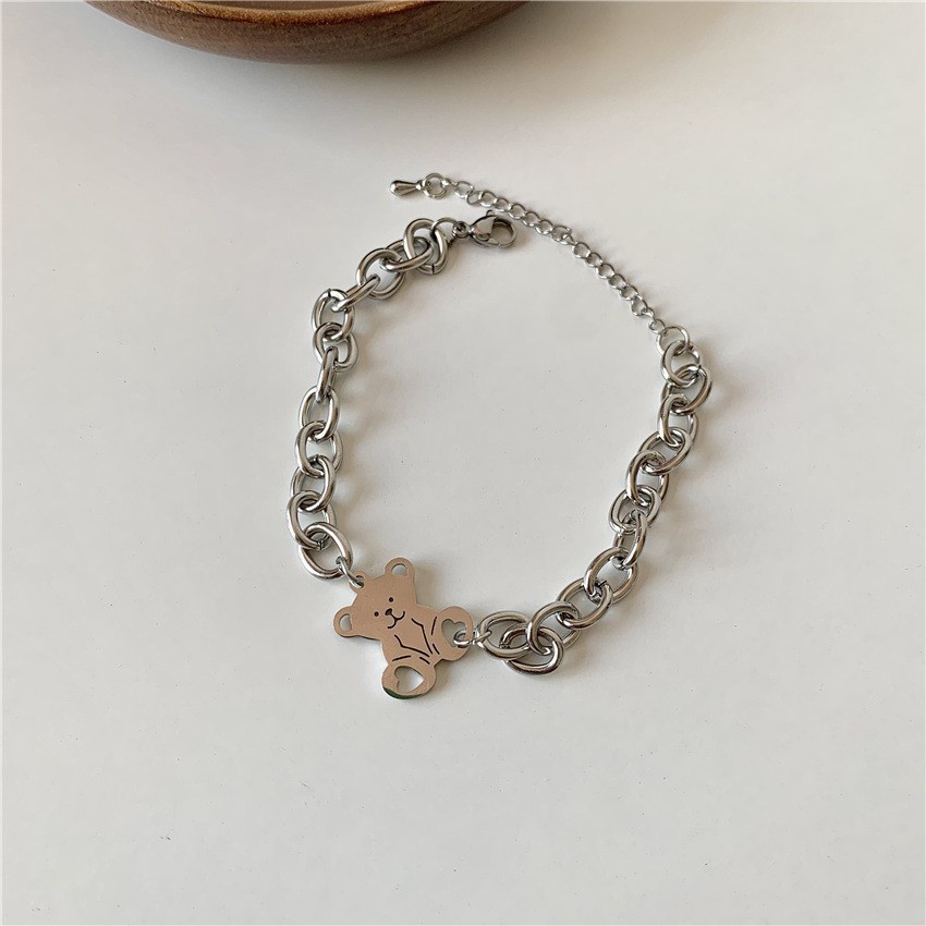 Gelang Bangle Bahan Titanium Steel Warna Silver Dengan Liontin Beruang Untuk Wanita