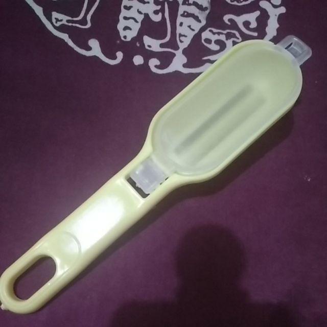 Pembersih Sisik Ikan