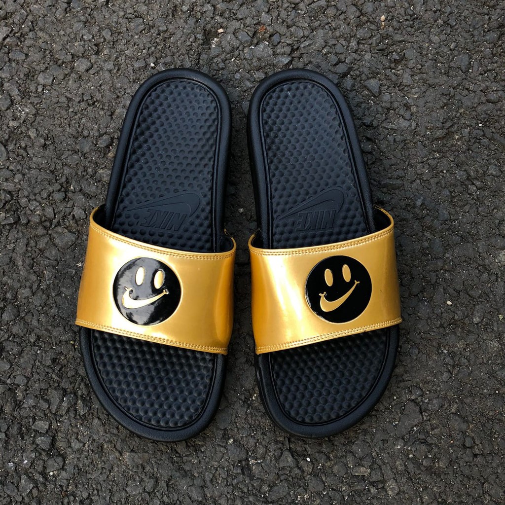 nike smiley slides