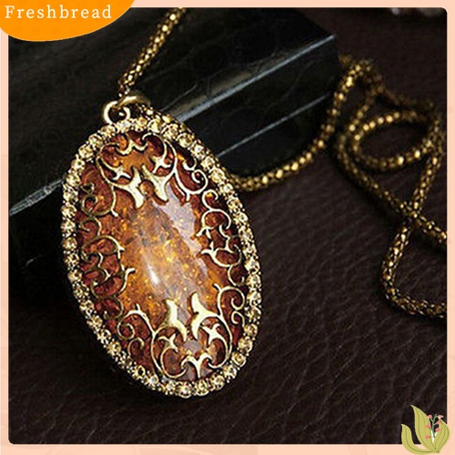 [TERLARIS]Women's Vintage Amber Tone Hollow Long Chain Drop Pendant Sweater Necklace