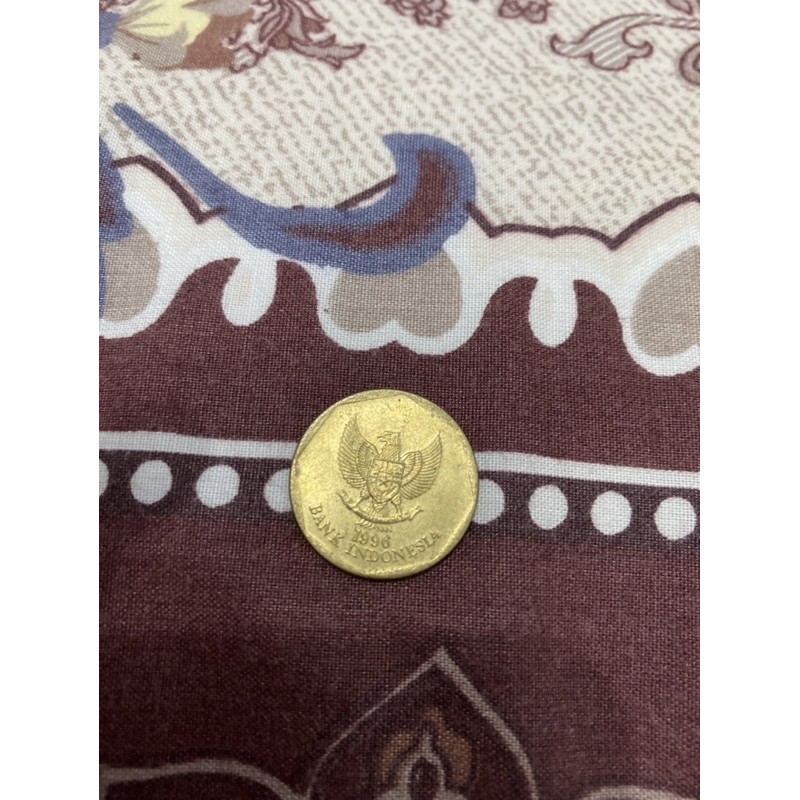 uang  kuno 100 rupiah (karapan sapi)