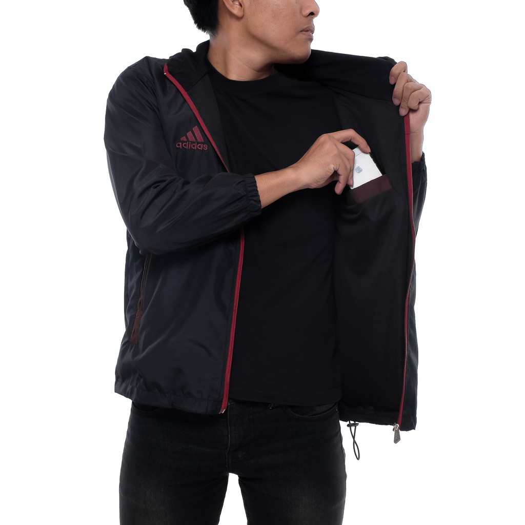 Jaket Parasut / Jaket Running Outdor Tracker F50 Hitam Strip Maroon